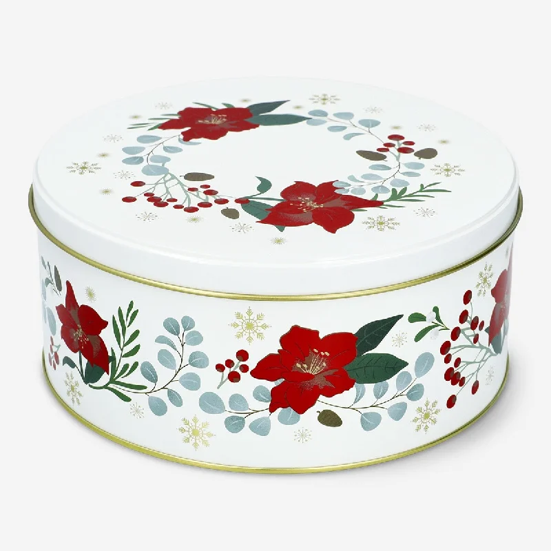 Round cake tin with Christmas flowers