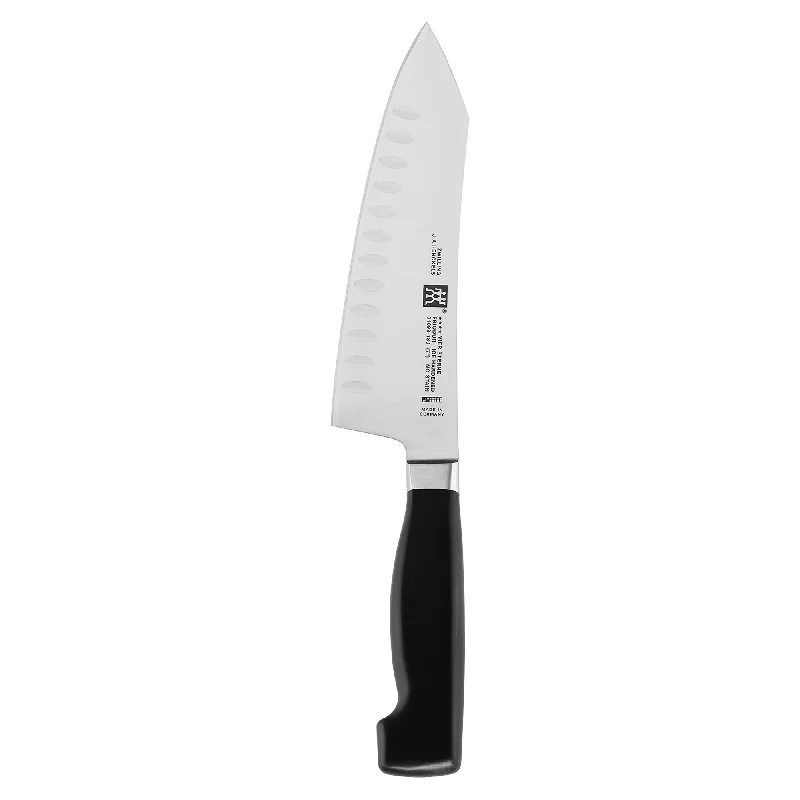 ZWILLING Four Star 7-inch Hollow Edge Rocking Santoku Knife